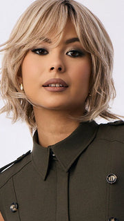 Model is wearing BRANN in SANDY BEIGE BLONDE R | Carefully placed shades of dark sandy blonde and light neutral blonde with medium root tone for added depth.               
