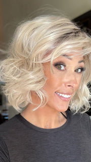 Nichole Corbett @nicholealee wearing BRIGHTON by ESTETICA in color SUNLIT-BLONDE | Soft Blend of Sandy Blonde, Lightest Blonde and Iced Blonde with a Light Golden Brown Root