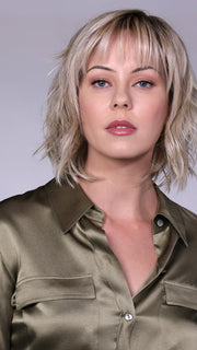 Model is wearing BROADWAY By BELLETRESS in CRUSHED-ALMOND-BLONDE-R | A Soft Neutral Light Blonde with a Light and Medium Blended Root Color