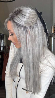 Nichole Corbett @nicholealee wearing BROOKLYN by RENE OF PARIS in color SILVER-BROWN-MR | Micro Root that transcends into Silver, Grey and Honey Brown Tones | styled with a flat iron for a sleeker look