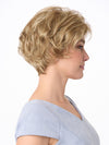 Model is wearing BRYN by ENVY in color DARK BLONDE | 2 toned blend of Dark Honey Blonde with Lighter Blonde highlights