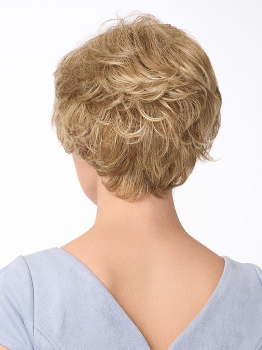 Model is wearing BRYN by ENVY in color DARK BLONDE | 2 toned blend of Dark Honey Blonde with Lighter Blonde highlights