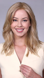 Model is wearing CAMBRIDGE in color BUTTERCREAM-BLONDE | Rich Golden Blonde with light blonde low lights