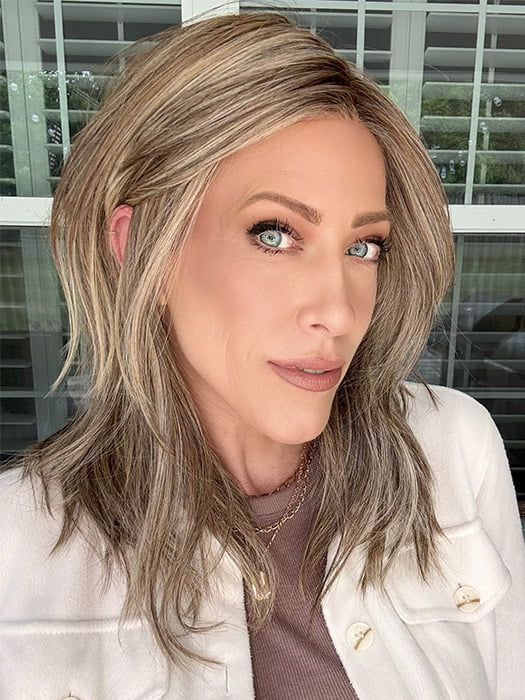 Kristyna Moore @kristynamoore wearing CAPRI by BELLE TRESS in color MACADAMIA LATTE R | A combination of Medium and Light Brown, highlighted with Light Gold Blonde, and a mixture of Ash Blonde and Light Gold Blonde, Rooted with Medium and Light Brown 
