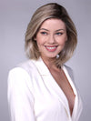 Model is wearing CARDIFF in  MILKSHAKE BLONDE R | A mixture of Light Sandy Brown, Highlighted with Light Ash Blonde with a Hint of Light Platinum Blonde with a Medium Root Color