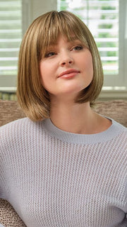 Model wearing CARLEY by ENVY in HONEY BREEZE | A blend of Cool, Honey Blonde and Multi-Dimensional Medium Brown with Darker Brown Roots