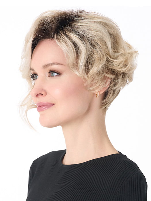 Model is wearing CARRISSA by ENVY in color PLATINUM SHADOW | Light Blonde with Dark Roots