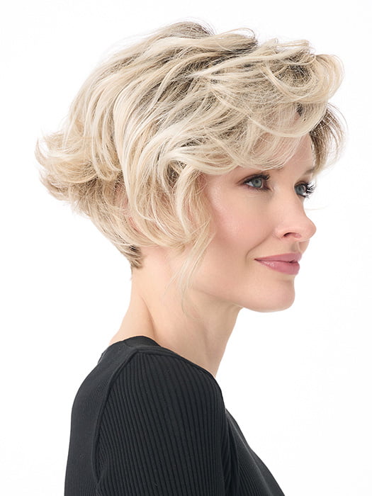 Model is wearing CARRISSA by ENVY in color PLATINUM SHADOW | Light Blonde with Dark Roots