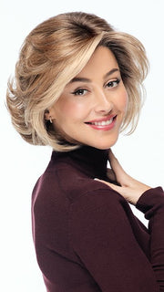 The soft waves and expertly cut layers create a naturally tousled look