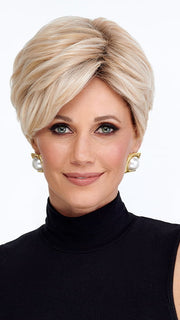 Model is wearing CHOPPED PIXIE by TRESSALLURE in color 24/102/R12 | Gold Blonde with Platinum highlights with Gold Brown roots