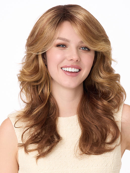 Model is wearing CHRISTINE by ENVY in color GOLDEN NUTMEG | Medium Brown roots with overall Warm Cinnamon base and Golden Blonde highlights