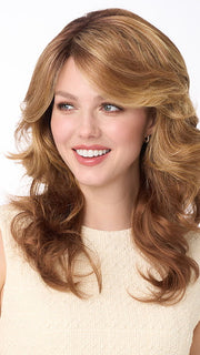 Model is wearing CHRISTINE by ENVY in color GOLDEN NUTMEG | Medium Brown roots with overall Warm Cinnamon base and Golden Blonde highlights