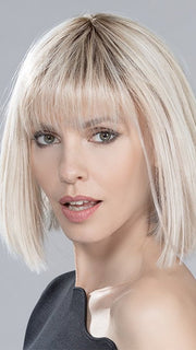 Its basic cap construction has a monofilament crown for a more natural appearance