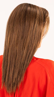 Roxie wearing color HOT MOCCA ROOTED | Warm Medium Brown, Light Auburn, and Dark Auburn Blend