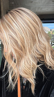 Jenny B. @thewiggygirl wearing COREY by ENVY in color SPARKLING CHAMPAGNE | Medium Brown roots with overall Strawberry Blonde base and soft Golden Blonde highlights