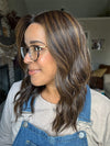 Brea @getwiggywithbrea wearing COREY by ENVY in color AMARETTO CREAM | Dark Brown roots with overall Medium Brown base with Honey Blonde highlights