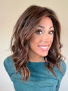 Nichole Corbett @nicholealee wearing COREY by ENVY in color AMARETTO CREAM | Dark Brown roots with overall Medium Brown base with Honey Blonde highlights