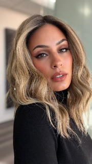 Model is wearing COREY by ENVY in color HONEY BREEZE | A blend of Cool, Honey Blonde and Multi-Dimensional Medium Brown with Darker Brown Roots
