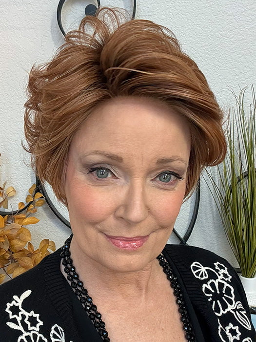 Mel B. @mels.be.ageless wearing CURATED CUT by RAQUEL WELCH in color RL29/33SS ICED PUMPKIN SPICE | Strawberry Blonde Shaded with Dark Red-Brown