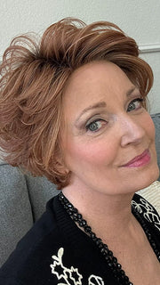 Mel B. @mels.be.ageless wearing CURATED CUT by RAQUEL WELCH in color RL29/33SS ICED PUMPKIN SPICE | Strawberry Blonde Shaded with Dark Red-Brown