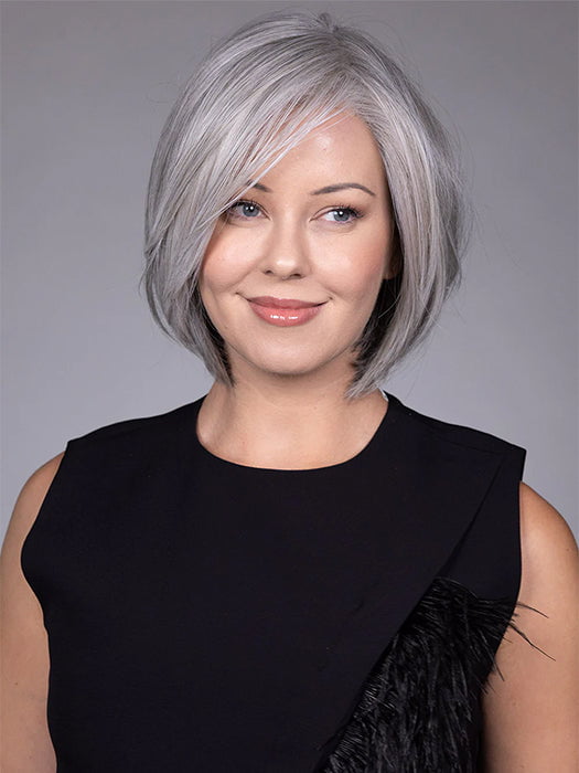 Model is wearing DION in color COCANUT MILK GREY R | Creamy, off-white tones with soft gray hues, creating a pearlescent or silvery finish.