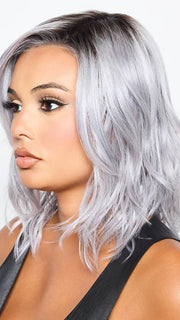 This heat friendly synthetic wig has subtle layers and ethereal beach waves