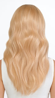 Model is wearing DYNAMIC by TRESSALLURE in color SS24/102/R12 | Golden Blonde Highlighted Platinum Rooted Light Golden Brown