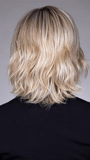 Model is wearing ELSA by BELLETRESS in color BUTTERBEER R | Dark Brown Base and Root that transitions smoothly into a buttery blonde, infused with creamy honey and toffee tones