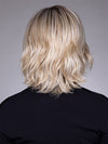 Model is wearing ELSA by BELLETRESS in color BUTTERBEER R | Dark Brown Base and Root that transitions smoothly into a buttery blonde, infused with creamy honey and toffee tones