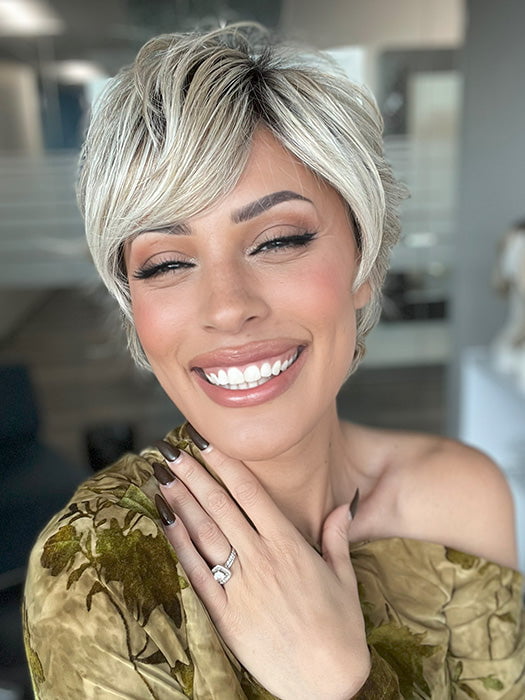 Roxie is wearing EDGE FACTOR by GABOR in color GF19-23SS BISCUIT | Light Ash Blonde Evenly Blended with Cool Platinum Blonde with Dark Roots