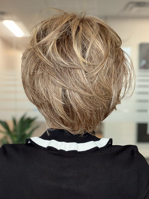 Model is wearing EFFORTLESS STYLE by RAQUEL WELCH in color SS11/25 SHADED HONEY PECAN | Chestnut Brown base blends into multi-dimensional tones of Brown and Golden Blonde