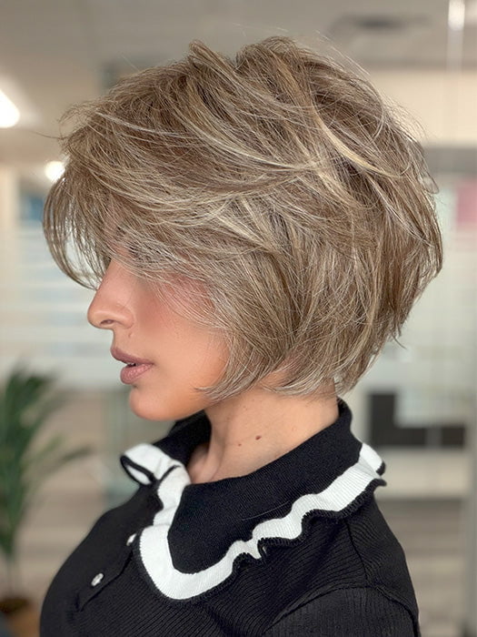 Model is wearing EFFORTLESS STYLE by RAQUEL WELCH in color SS11/25 SHADED HONEY PECAN | Chestnut Brown base blends into multi-dimensional tones of Brown and Golden Blonde
