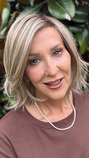 Eileen @crazywiglady is wearing ELSA by BELLE TRESS in color SPARKLING CHAMPAGNE BLONDE R | A radiant blend of champagne blonde with soft golden and beige tones, grounded by natural-looking roots in ash brown and dark blonde.