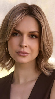 Model is wearing FARREN by AMORE in color SANDY-BEIGE-BLOND-R | Carefully placed shades of dark sandy blonde and light neutral blonde with medium root tone for added depth.  
