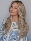 Heather @cjswigs wearing FEATURE LENGTH by RAQUEL WELCH in color RL19/23SS SHADED BISCUIT | Light Ash Blonde Evenly Blended with Cool Platinum Blonde with Dark Roots
