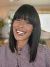 Model is wearing FRINGE EFFECT by HAIRDO in color R2 EBONY | Black