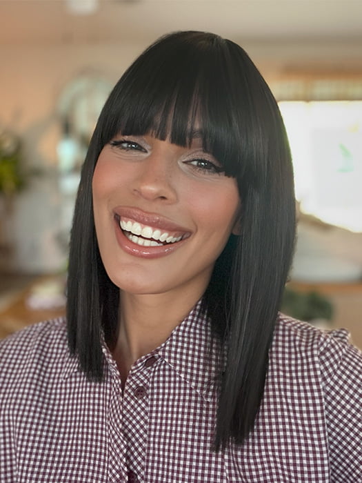 Model is wearing FRINGE EFFECT by HAIRDO in color R2 EBONY | Black