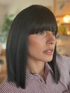 Model is wearing FRINGE EFFECT by HAIRDO in color R2 EBONY | Black