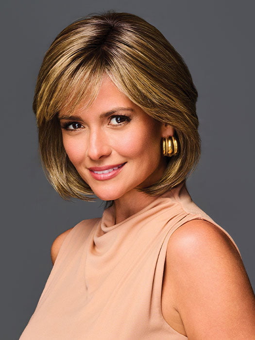 Model is wearing ALL THE RAGE by GABOR in color GF9-24SS SS ICED CAFE LATTE | Dark Brown shaded with Golden Brown