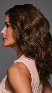 Subtle layers and undone waves fall past the shoulders