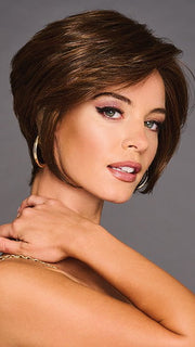 A modern wig with a sophisticated, sleek, and salon-inspired design.