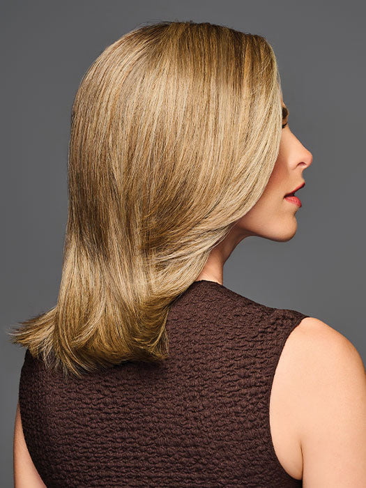 Model is wearing OWN THE ROOM LUXURY in color GF12-22 SS CAPPUCCINO | Light Golden Brown Evenly Blended with Cool Platinum Blonde Highlights with Dark Roots