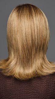 Model is wearing OWN THE ROOM LUXURY in color GF12-22 SS CAPPUCCINO | Light Golden Brown Evenly Blended with Cool Platinum Blonde Highlights with Dark Roots