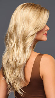 Model is wearing Sweetly Subtle by Gabor in color GL14-22SS SS SANDY BLONDE | Dark golden blonde base blends into multi-dimensional tones of medium gold blonde and light beige blonde