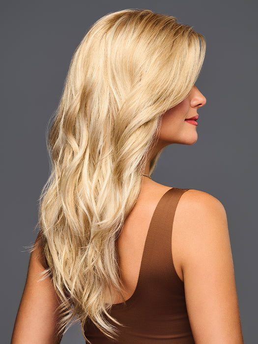 Model is wearing Sweetly Subtle by Gabor in color GL14-22SS SS SANDY BLONDE | Dark golden blonde base blends into multi-dimensional tones of medium gold blonde and light beige blonde