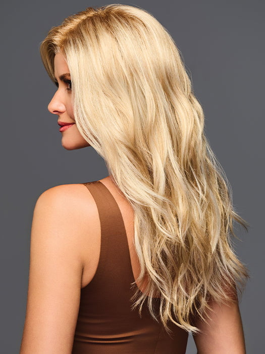 Model is wearing Sweetly Subtle by Gabor in color GL14-22SS SS SANDY BLONDE | Dark golden blonde base blends into multi-dimensional tones of medium gold blonde and light beige blonde