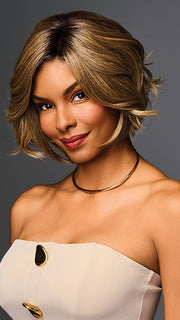 Model is wearing TREND ALERT LUXURY in color GF11-25 SS HONEY PECAN | Chestnut Brown base blends into multi-dimensional tones of Brown and Golden Blonde