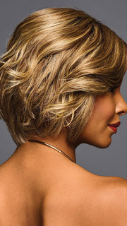 Model is wearing TREND ALERT LUXURY in color GF11-25 SS HONEY PECAN | Chestnut Brown base blends into multi-dimensional tones of Brown and Golden Blonde