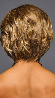 Model is wearing TREND ALERT LUXURY in color GF11-25 SS HONEY PECAN | Chestnut Brown base blends into multi-dimensional tones of Brown and Golden Blonde