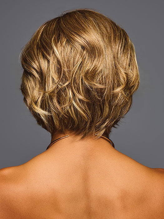 Model is wearing TREND ALERT LUXURY in color GF11-25 SS HONEY PECAN | Chestnut Brown base blends into multi-dimensional tones of Brown and Golden Blonde